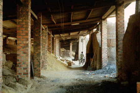 Inside the fuel sheds with the kiln mouths to the right