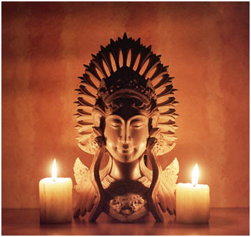 Candle lit wooden carving from Bali